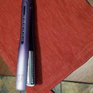 Caj flip and bend styling iron